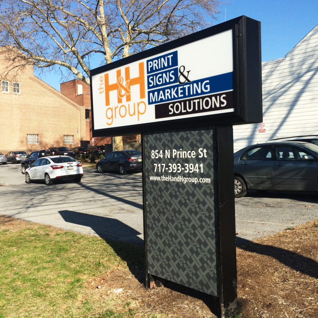 The H&H Group street sign