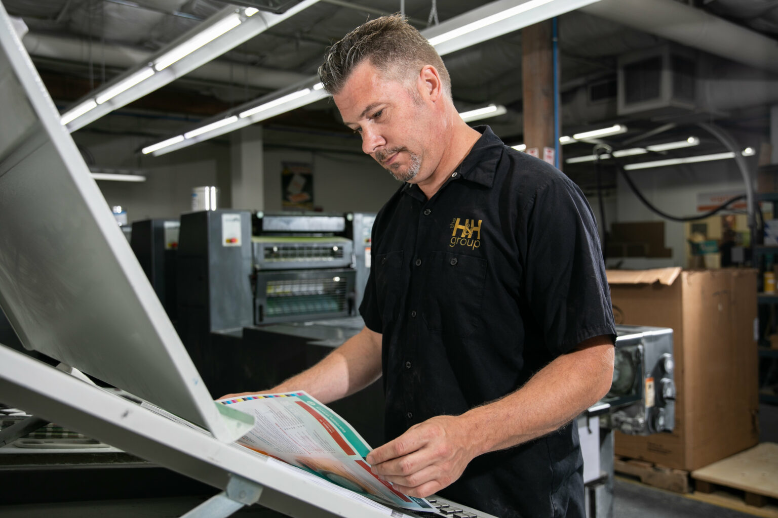 man reviewing a print job