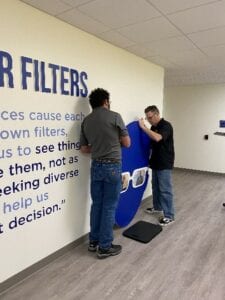 installing a wall sign
