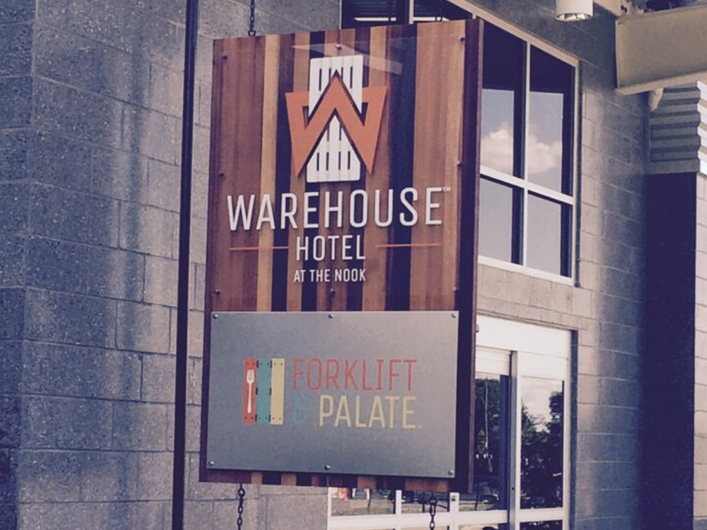 the warehouse hotel sign