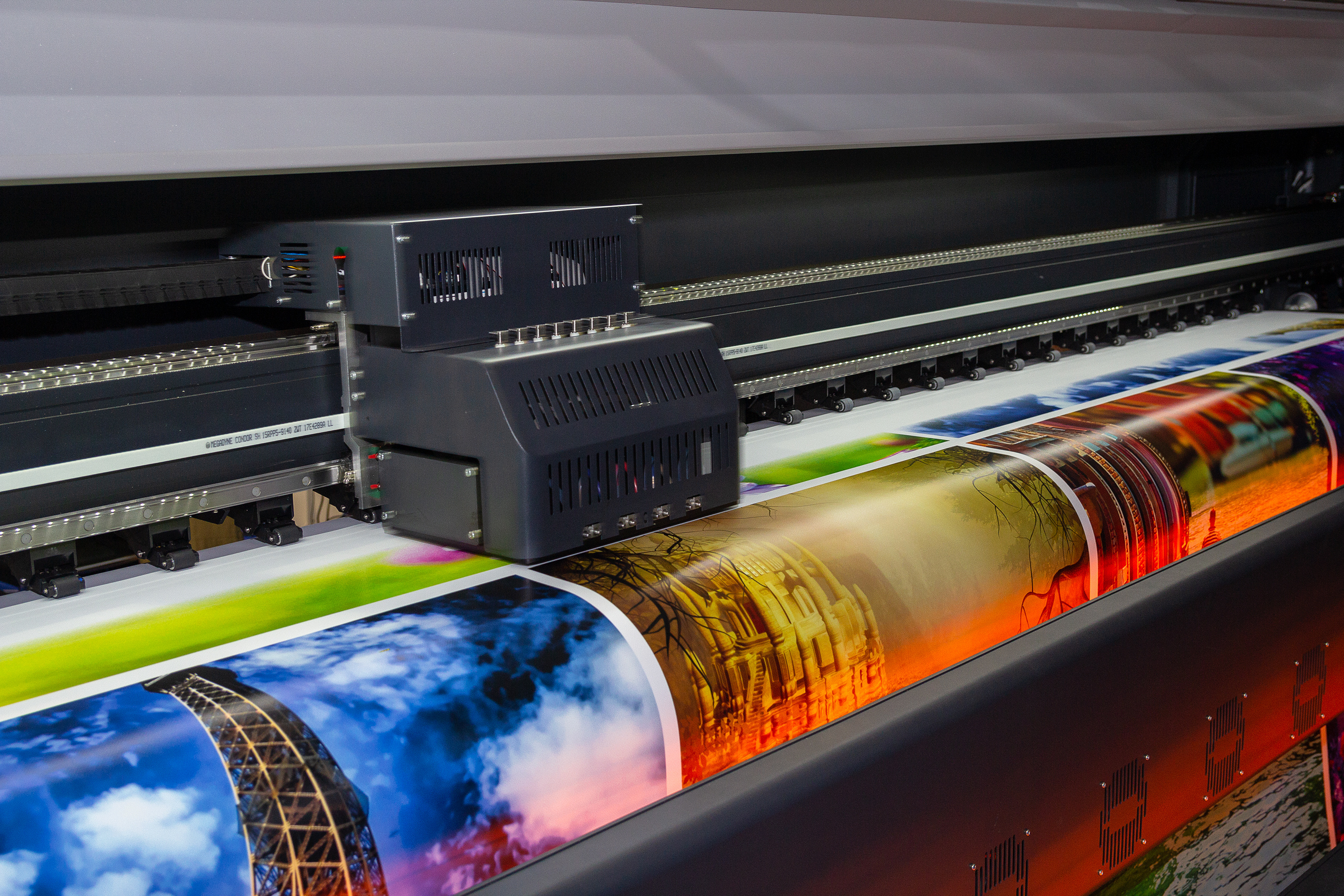 An image of a printer printing color photos